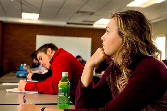 student looking at front of class